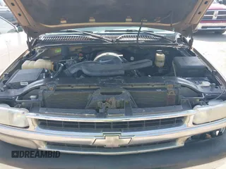 2001 Chevrolet Suburban LS z VIN 3GNEC16T21G214738, wystawiony jako IAAI lot #42433747 z przebiegiem Nie podano mil oraz . Historia ofert i sprzedaży dostępna na DreamBid. Obrazek 10.