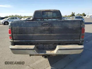 1996 Dodge 1500 z VIN 3B7HC13Y0TM120450, wystawiony jako Copart lot #78552594 z przebiegiem 317 248 mil mil oraz Szkoda całkowita • Salvage title. Historia ofert i sprzedaży dostępna na DreamBid. Obrazek 6.