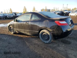 2008 Honda Civic Cpe DX with VIN 2HGFG12258H007657, listed as a Copart auction lot 76782534 with 181,987 mi miles and Salvage Title. Bid and sale history available at carsss.com. Image 2.
