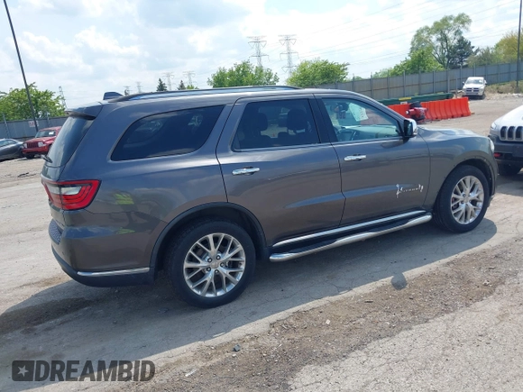 2014 Dodge Durango Citadel with VIN 1C4RDJEG0EC978611, listed as a IAAI auction lot 42250344 with 200,412 mi miles and . Bid and sale history available at DreamBid. Image 4.