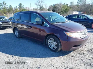 2013 Honda Odyssey LX with VIN 5FNRL5H21DB082331, listed as a IAAI auction lot 41756206 with 249,204 mi miles and . Bid and sale history available at carsss.com. Image 1.
