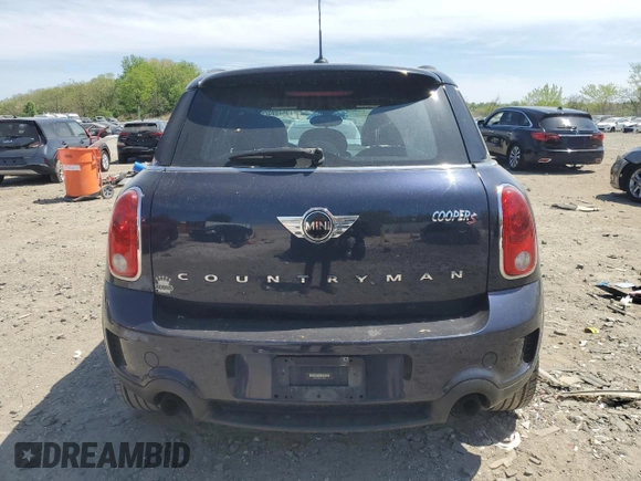 2015 MINI Countryman S with VIN WMWZC3C52FWT05882, listed as a Copart auction lot 54399525 with 125,971 mi miles and Salvage title. Bid and sale history available at DreamBid. Image 6.