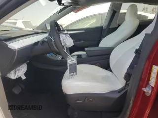 2024 Tesla Model Y Long Range z VIN 7SAYGDEE7RA252756, wystawiony jako Copart lot #58738215 z przebiegiem 13 698 mil mil oraz Szkoda całkowita • Salvage title. Historia ofert i sprzedaży dostępna na DreamBid. Obrazek 7.