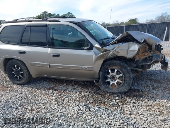 2003 GMC Envoy SLT with VIN 1GKDS13SX32203909, listed as a IAAI auction lot 41457713 with 199,507 mi miles. Bid and sale history available at carsss.com. Image 14.