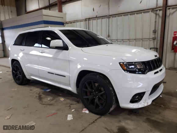 2021 Jeep Grand Cherokee SRT with VIN 1C4RJFDJXMC711364, listed as a Copart auction lot 85362514 with 24,528 mi miles and Salvage Title. Bid and sale history available at carsss.com. Image 4.