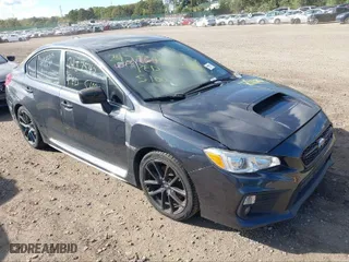 2019 Subaru WRX Premium with VIN JF1VA1F64K8809712, listed as a IAAI auction lot 41274034 with 82,689 mi miles. Bid and sale history available at carsss.com. Image 1.