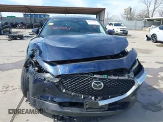 2021 Mazda CX-30 Select with VIN 3MVDMABL5MM272418, listed as a IAAI auction lot 41783355 with 25,429 mi miles and . Bid and sale history available at DreamBid. Image 6.