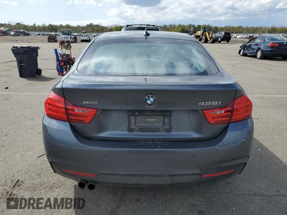2016 BMW 4 Series 428i xDrive with VIN WBA4C9C50GG137720, listed as a Copart auction lot 50240545 with 60,705 mi miles and Salvage Title. Bid and sale history available at DreamBid. Image 6.
