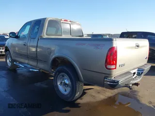 2001 Ford F-150 XL with VIN 1FTRX18L31NA75349, listed as a IAAI auction lot 40921255 with 165,872 mi miles. Bid and sale history available at carsss.com. Image 3.