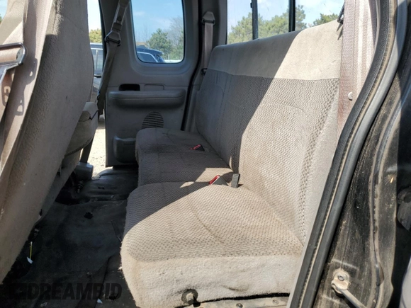 1999 Ford F-150 with VIN 1FTRX18W1XKC00918, listed as a Copart auction lot 53830305 with 205,205 mi miles and Salvage title. Bid and sale history available at DreamBid. Image 10.
