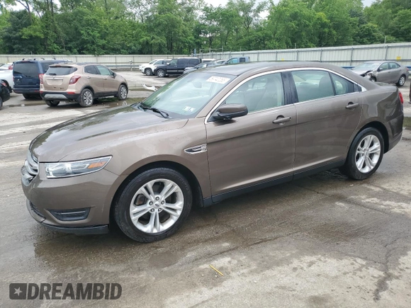 2015 Ford Taurus SEL z VIN 1FAHP2E84FG102075, wystawiony jako Copart lot #59740265 z przebiegiem 90 669 mil mil oraz Szkoda całkowita • Salvage title. Historia ofert i sprzedaży dostępna na DreamBid. Obrazek 1.