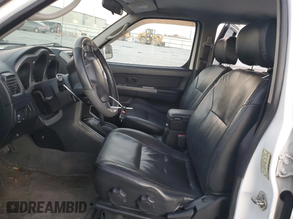 2004 Nissan Frontier LE with VIN 1N6ED27T14C451784, listed as a Copart auction lot 83341854 with 137,982 mi miles and Salvage title. Bid and sale history available at DreamBid. Image 7.