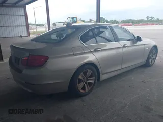 2013 BMW 5 Series 528i with VIN WBAXG5C52DDY35141, listed as a IAAI auction lot 41883031 with 112,917 mi miles and . Bid and sale history available at carsss.com. Image 4.