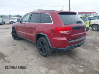 2013 Jeep Grand Cherokee Laredo with VIN 1C4RJEAG4DC573971, listed as a IAAI auction lot 41627288 with 143,256 mi miles. Bid and sale history available at carsss.com. Image 3.