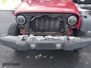 2010 Jeep Wrangler Unlimited Sport with VIN 1J4BA3H14AL217520, listed as a IAAI auction lot 41380169 with 153,672 mi miles. Bid and sale history available at carsss.com. Image 6.