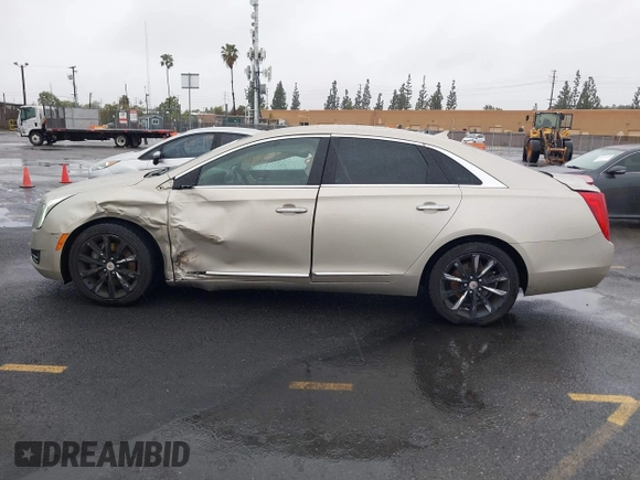 2013 Cadillac XTS z VIN 2G61N5S32D9127146, wystawiony jako IAAI lot #41578528 z przebiegiem 98 529 mil mil oraz . Historia ofert i sprzedaży dostępna na DreamBid. Obrazek 14.
