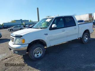 2003 Ford F-150 XLT with VIN 1FTRW08633KD11896, listed as a IAAI auction lot 42137360 with 118,654 mi miles. Bid and sale history available at carsss.com. Image 2.