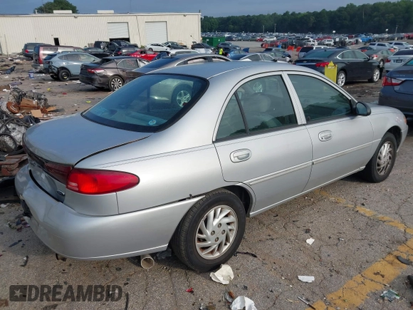 1999 Ford Escort SE z VIN 1FAFP13P6XW200107, wystawiony jako IAAI lot #42600719 z przebiegiem 113 515 mil mil oraz . Historia ofert i sprzedaży dostępna na DreamBid. Obrazek 4.