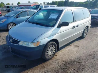 2004 Honda Odyssey LX with VIN 5FNRL18534B007617, listed as a IAAI auction lot 42687524 with 220,079 mi miles and . Bid and sale history available at DreamBid. Image 2.