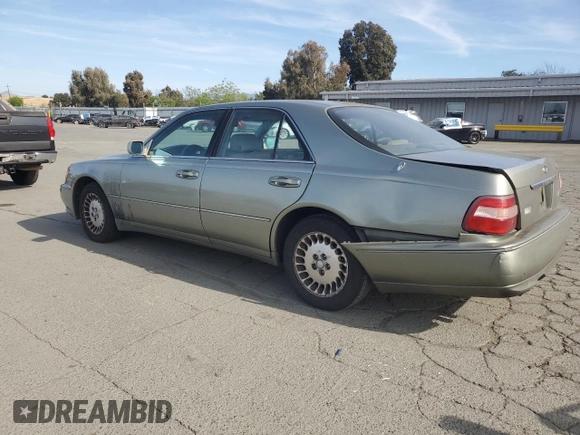 2001 Infiniti Q45 Touring with VIN JNKBY31A01M101364, listed as a Copart auction lot 54859845 with 213,588 mi miles and Salvage Title. Bid and sale history available at DreamBid. Image 2.