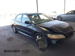 2002 Honda Accord EX z VIN 1HGCG165X2A059914, wystawiony jako IAAI lot #42229494 z przebiegiem 196 886 mil mil oraz . Historia ofert i sprzedaży dostępna na DreamBid. Obrazek 1.