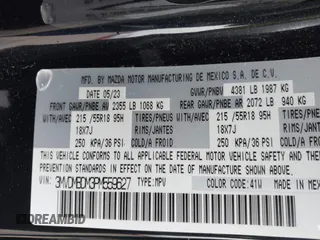 2023 Mazda CX-30 2.5 S Premium Package with VIN 3MVDMBDM3PM559627, listed as a IAAI auction lot 40910485 with 8,365 mi miles. Bid and sale history available at carsss.com. Image 9.