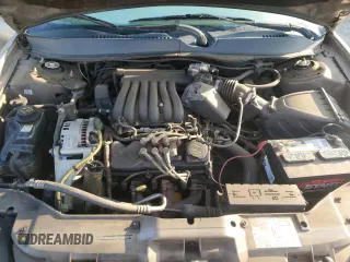 2003 Ford Taurus z VIN 1FAFP52253A170456, wystawiony jako Copart lot #70009824 z przebiegiem 216 567 mil mil oraz Szkoda całkowita • Salvage title. Historia ofert i sprzedaży dostępna na DreamBid. Obrazek 11.