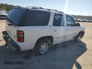 2006 GMC Yukon SLT z VIN 1GKEC13Z46J103782, wystawiony jako Copart lot #84412634 z przebiegiem 201 289 mil mil oraz Szkody całkowita. Historia ofert i sprzedaży dostępna na DreamBid. Obrazek 3.