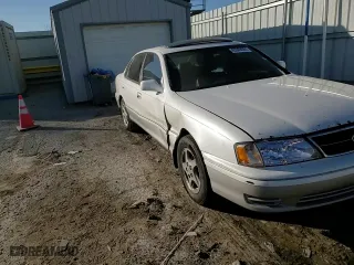 1999 Toyota Avalon XL with VIN 4T1BF18B3XU310192, listed as a Copart auction lot 85969084 with NaN miles and Salvage Title. Bid and sale history available at carsss.com. Image 11.