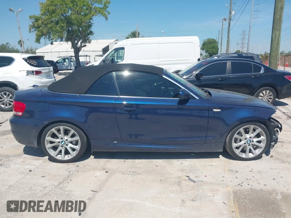 2013 BMW 1 Series 135i with VIN WBAUN7C57DVM28236, listed as a IAAI auction lot 41900116 with 38,876 mi miles and . Bid and sale history available at carsss.com. Image 14.