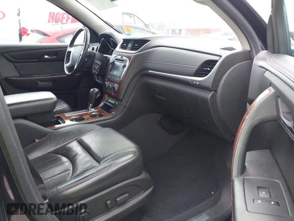 2014 Chevrolet Traverse LTZ with VIN 1GNKRJKD1EJ203282, listed as a IAAI auction lot 41984380 with 219,819 mi miles and . Bid and sale history available at DreamBid. Image 5.