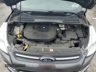 2016 Ford Escape SE z VIN 1FMCU9G95GUC33848, wystawiony jako Copart lot #58191925 z przebiegiem 108 194 mil mil oraz Szkoda całkowita • Salvage title. Historia ofert i sprzedaży dostępna na DreamBid. Obrazek 12.