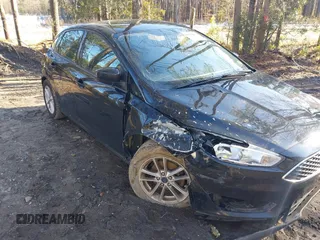 2018 Ford Focus SE with VIN 1FADP3F20JL218002, listed as a IAAI auction lot 41636952 with 90,059 mi miles and . Bid and sale history available at carsss.com. Image 1.