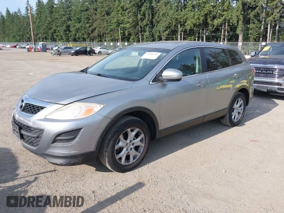 2012 Mazda CX-9 Sport z VIN JM3TB3BA9C0348888, wystawiony jako IAAI lot #42520255 z przebiegiem 138 012 mil mil oraz . Historia ofert i sprzedaży dostępna na DreamBid. Obrazek 2.