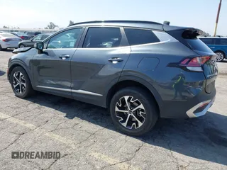 2023 Kia Sportage EX with VIN KNDPVCAG4P7014112, listed as a IAAI auction lot 42610022 with 50,680 mi miles and . Bid and sale history available at DreamBid. Image 3.
