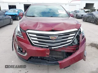 2017 Cadillac XT5 FWD with VIN 1GYKNARS2HZ107587, listed as a IAAI auction lot 41614842 with 124,611 mi miles and . Bid and sale history available at carsss.com. Image 12.