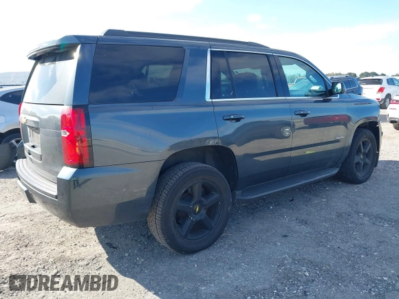 2020 Chevrolet Tahoe LT with VIN 1GNSCBKC4LR246060, listed as a IAAI auction lot 41272902 with 105,417 mi miles and . Bid and sale history available at DreamBid. Image 4.