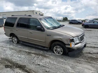 2001 Ford Expedition XLT with VIN 1FMRU15W41LA73480, listed as a Copart auction lot 56740535 with 258,678 mi miles and Salvage title. Bid and sale history available at DreamBid. Image 4.
