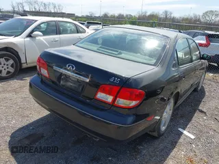 2003 Infiniti I35 Luxury with VIN JNKDA31A23T117216, listed as a IAAI auction lot 41870918 with 126,840 mi miles. Bid and sale history available at carsss.com. Image 4.