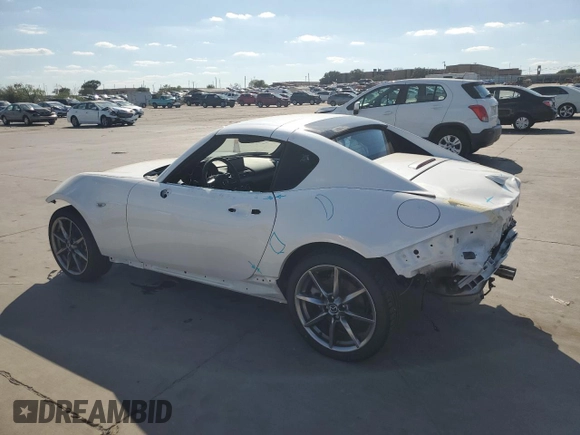 2023 Mazda MX-5 Miata Grand Touring with VIN JM1NDAM76P0561207, listed as a Copart auction lot 72202434 with 6,928 mi miles and Salvage title. Bid and sale history available at DreamBid. Image 2.