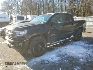 2021 Chevrolet Colorado 4WD Z71 with VIN 1GCGTDENXM1240416, listed as a Copart auction lot 87875155 with 100,981 mi miles and Salvage Title. Bid and sale history available at carsss.com. Image 1.