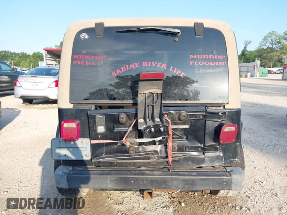 2000 Jeep Wrangler Sahara with VIN 1J4FA59SXYP718029, listed as a IAAI auction lot 42583372 with 260,811 mi miles and . Bid and sale history available at DreamBid. Image 16.