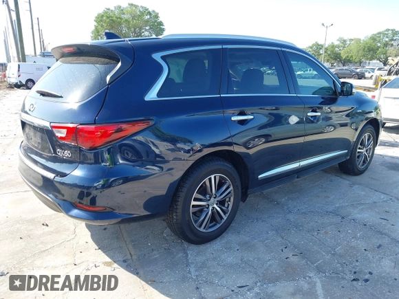 2016 Infiniti QX60 with VIN 5N1AL0MN4GC514410, listed as a IAAI auction lot 41918705 with 102,747 mi miles and . Bid and sale history available at DreamBid. Image 4.