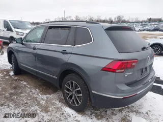 2020 Volkswagen Tiguan SE with VIN 3VV2B7AX7LM066135, listed as a IAAI auction lot 41349357 with 106,575 mi miles. Bid and sale history available at carsss.com. Image 3.
