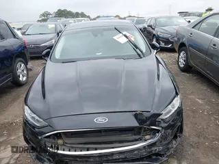 2020 Ford Fusion SE z VIN 3FA6P0HD5LR178607, wystawiony jako IAAI lot #42094774 z przebiegiem 123 341 mil mil oraz . Historia ofert i sprzedaży dostępna na DreamBid. Obrazek 11.