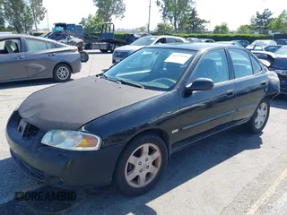 2005 Nissan Sentra S z VIN 3N1CB51D15L559284, wystawiony jako IAAI lot #42273159 z przebiegiem 217 646 mil mil oraz . Historia ofert i sprzedaży dostępna na DreamBid. Obrazek 2.