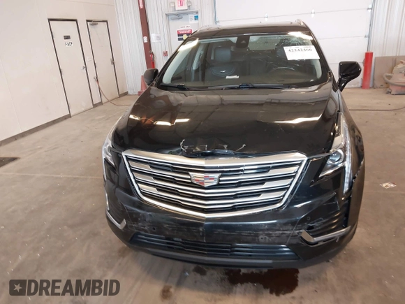2019 Cadillac XT5 Luxury FWD z VIN 1GYKNCRS2KZ197052, wystawiony jako IAAI lot #42242466 z przebiegiem 86 678 mil mil oraz . Historia ofert i sprzedaży dostępna na DreamBid. Obrazek 6.