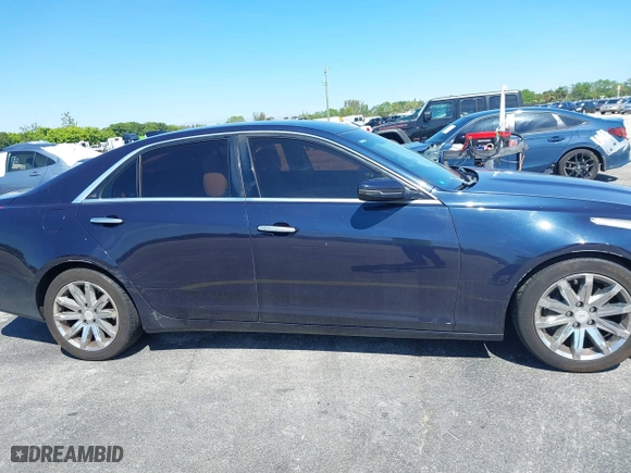 2016 Cadillac CTS Sedan RWD with VIN 1G6AP5SX8G0119984, listed as a IAAI auction lot 41679567 with 98,592 mi miles. Bid and sale history available at carsss.com. Image 13.