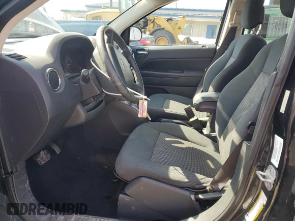2010 Jeep Compass Sport with VIN 1J4NF4FB2AD591523, listed as a Copart auction lot 48809775 with 105,720 mi miles and Salvage Title. Bid and sale history available at carsss.com. Image 7.