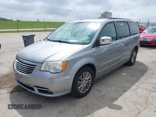 2014 Chrysler Town & Country Touring-L with VIN 2C4RC1CG2ER107917, listed as a IAAI auction lot 42180194 with 169,447 mi miles. Bid and sale history available at carsss.com. Image 17.